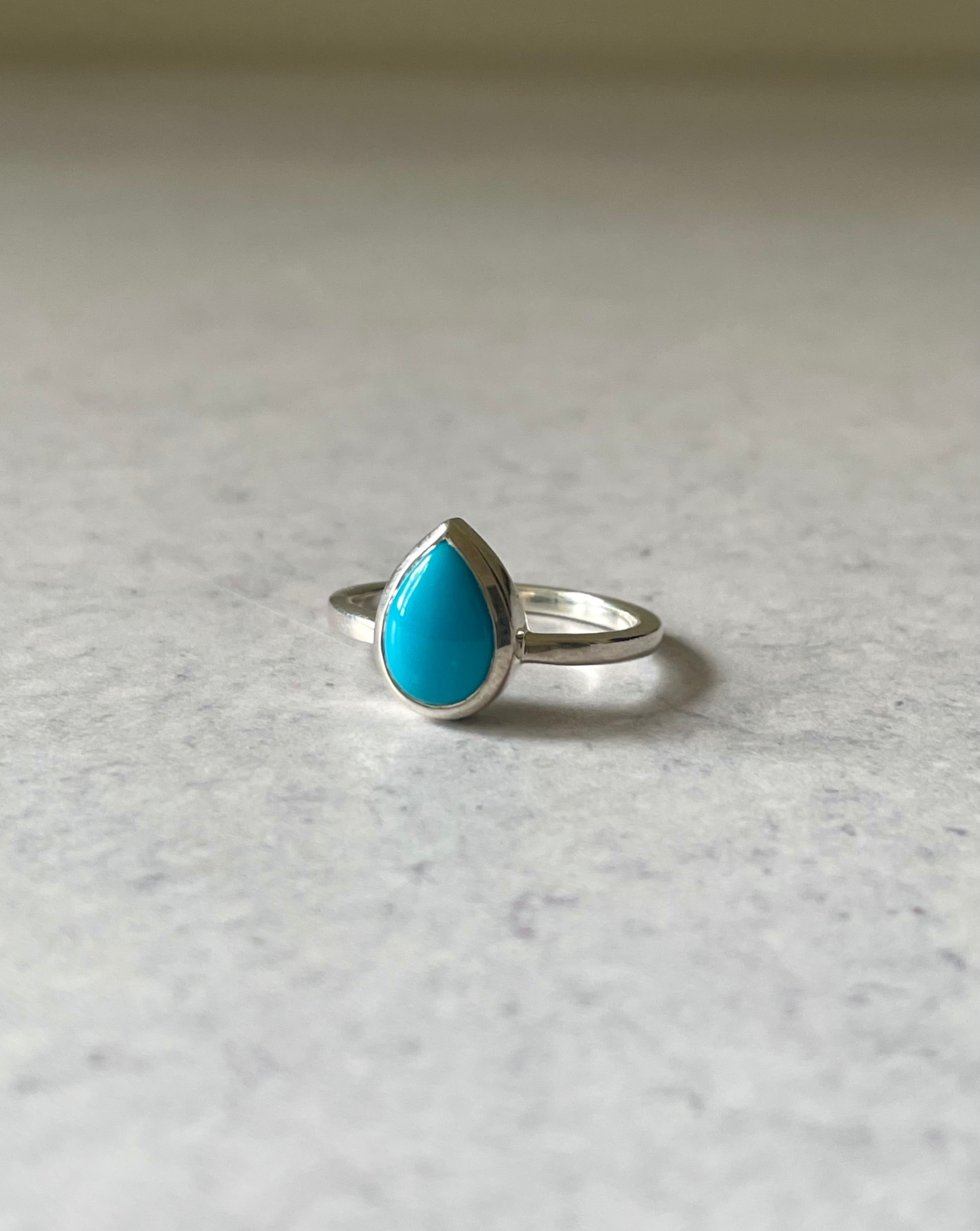 pear-shaped sleeping beauty turquoise gemstone bezel set in 925 silver ring