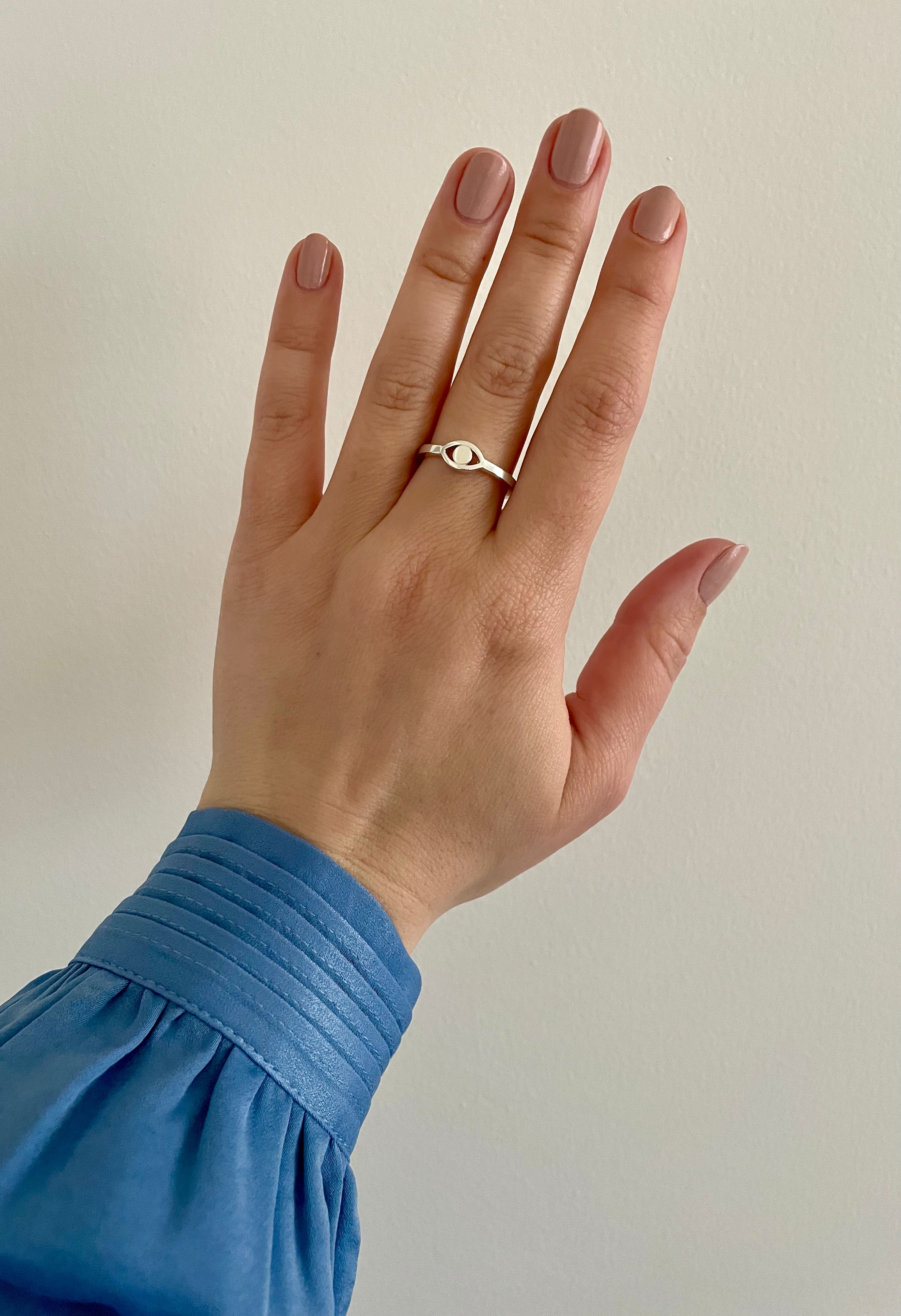 the silver evil eye ring keeps bad energy away