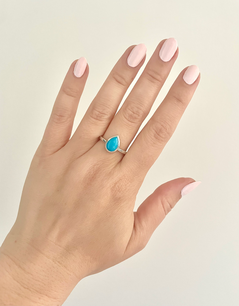 pear-shaped sleeping beauty turquoise gemstone ring is a timeless peace with a western edge